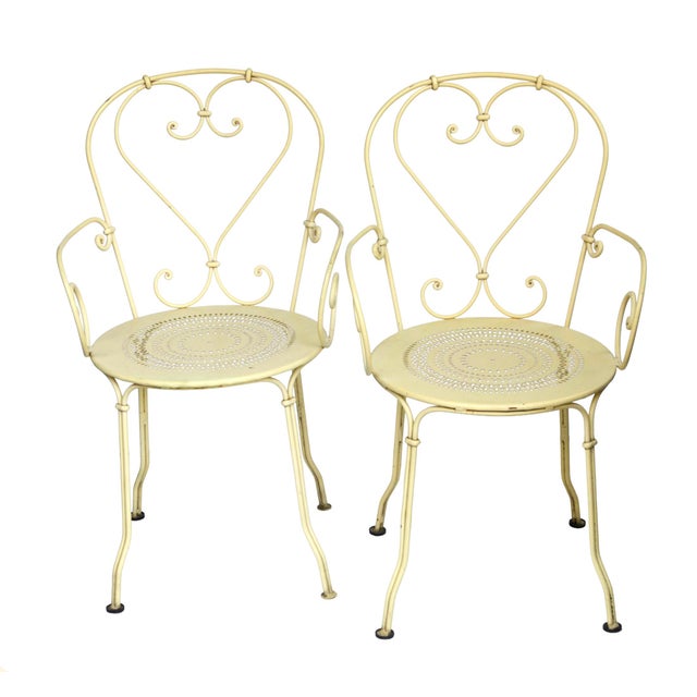 A Charming Set of Vintage French Garden Table & 4 Chairs. Made of wrought Iron and Pierced Design Metal Tabletop and...