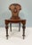 You are viewing a gorgeous pair of period Regency hall chairs with Gillows motifs Each chair features a solid, shield-...