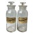 Antique Early 20th Century Glass Apothecary Jars Plumi Acet. & Ammon. Chlor- Set of 2 For Sale