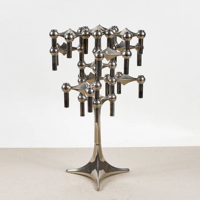 This iconic Orion modular candelabra, designed by Fritz Nagel and Ceasar Stoffi for BMF, represents a cornerstone of...