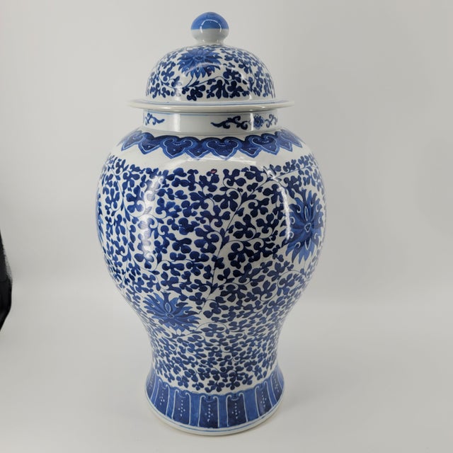 Add a touch of classical elegance to our home with this stunning Chinese Blue and White Chinoiserie Porcelain Ginger Jar...