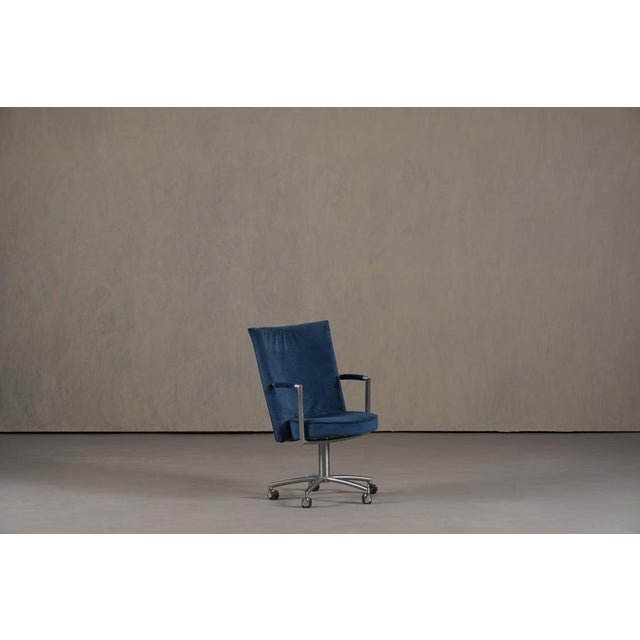 A comfortable lounge or office chair designed by Foersom & Hiort-Lorenzen and produced by Erik Jorgensen in Denmark during...