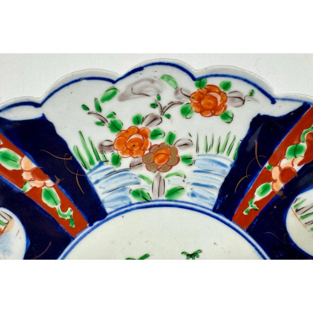 Imari Porcelain Large Antique Scalloped Edge Porcelain Imari Plate Decorated With Rich Colored Floral & Landscape Scenes From Japan - Circa 1880 For Sale - Image 4 of 11