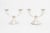 Pair of British Art Deco Silver Plate Candelabras, each with two branches on circular base and struck with marks "J" a...