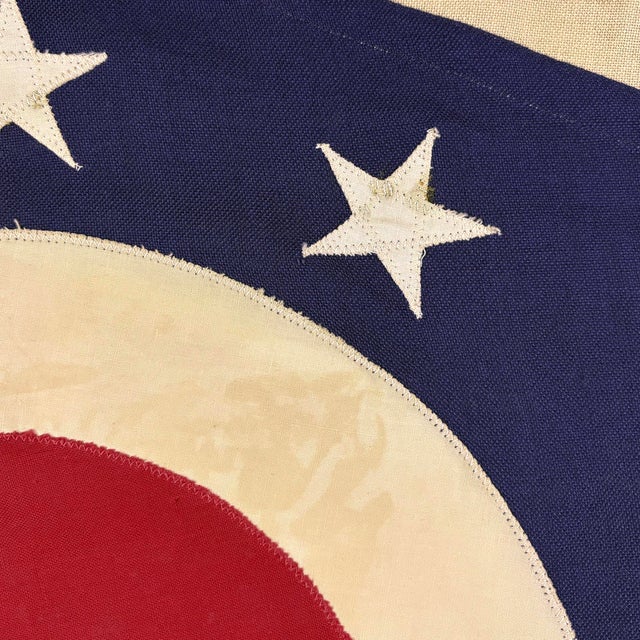 This vintage Ohio flag is made from a cotton cloth, with fully sewn design visible on both sides. Please note staining and...