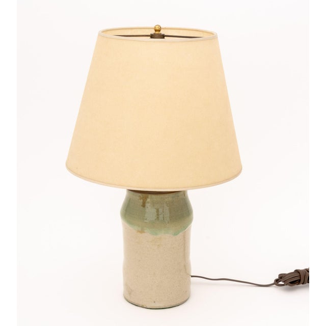 Modern Glazed Stoneware Table Lamp, green glaze band across the top, paper lamp shade. Overall: 16.75" H x 10.75"...