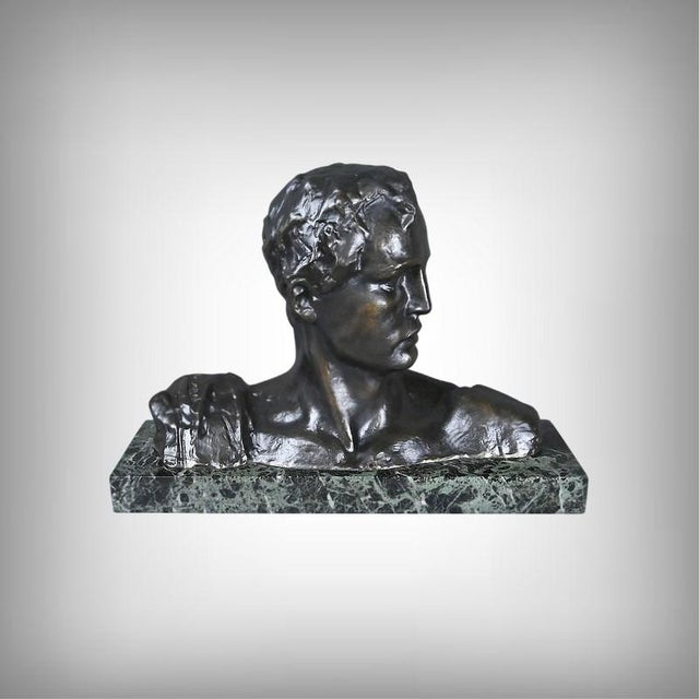 This large bronze sculpture by victor demanet is a remarkably intense male bust, modeled with a mastery that immediately...