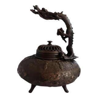 Vintage Chinese Bronze Tripod Censer With Pierced Lid and High-Relief Dragon Handle For Sale
