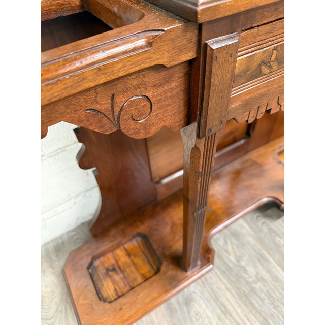 This is an absolutely stunning antique Victorian Eastlake walnut hall tree with burl walnut accents, an elaborately carved...