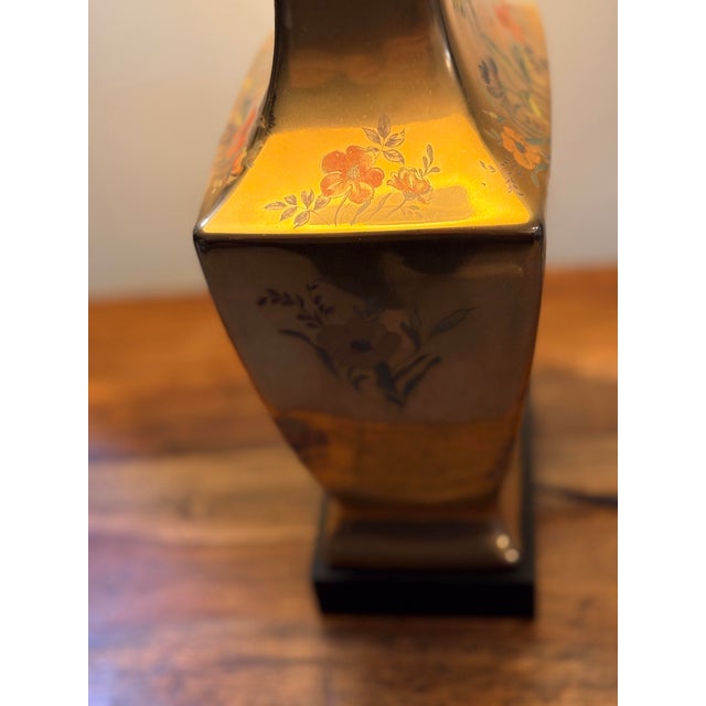 Vintage chinoiserie gold lamp by Morris Greenspan. Make a statement with this stunning vintage lamp, featuring a rich,...