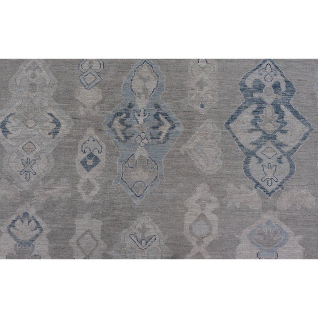 Turkish Oushak Rug With Soft Gray Field and Pale Blue Geometric Motifs For Sale - Image 11 of 16