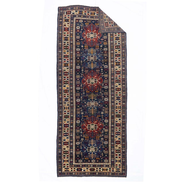 Antique Caucasian Shirvan Rug 4'1" x 9’10”. Eastern Caucasian, west Caspian Caucasian rugs, primarily scatters, in...