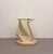 An elegant vintage accent table featuring a sculptural swan-form base with sweeping wings supporting a round glass top....
