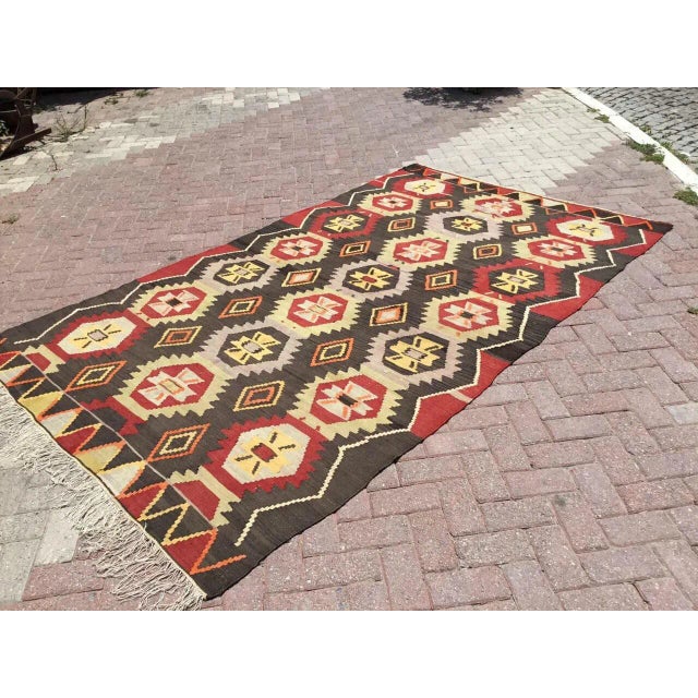 Beautiful, vintage, handwoven Kilim is approximately 60 years old. It is handmade of very fine quality, hand-spun wool in...