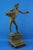 Wonderful, imposing sculpture in solid bronze, depicting a naked boy, with a vase and jug in his hand, standing above a...