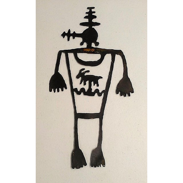 Unique laser cut metal figurine depicting a Petroglyph Rock Art Silhouette of the Horned Shaman with Antelope / Deer or...