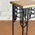 Bespoke structural black wrought iron table featuring a contrasting sandstone surface. Condition Vintage condition, some...
