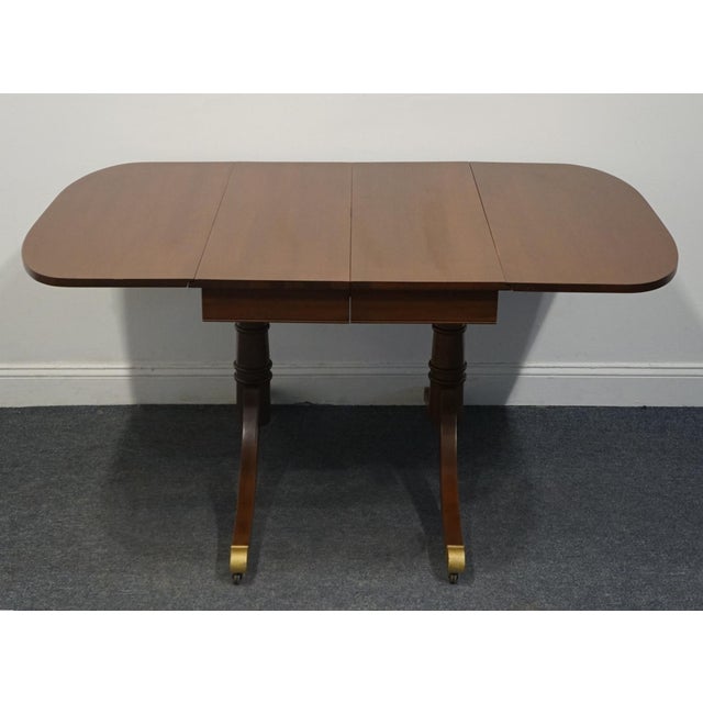 Wood Craddock Furniture Solid Mahogany Traditional Duncan Phyfe Style 70" Drop Leaf Pedestal Dining Table W. Self Storing Leaf For Sale - Image 7 of 12