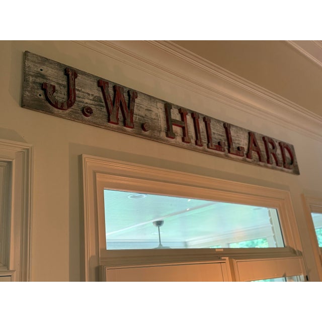Make a bold statement with this one-of-a-kind vintage carved wood name sign featuring the name “J.W. HILLARD.” Crafted...