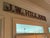 Make a bold statement with this one-of-a-kind vintage carved wood name sign featuring the name “J.W. HILLARD.” Crafted...