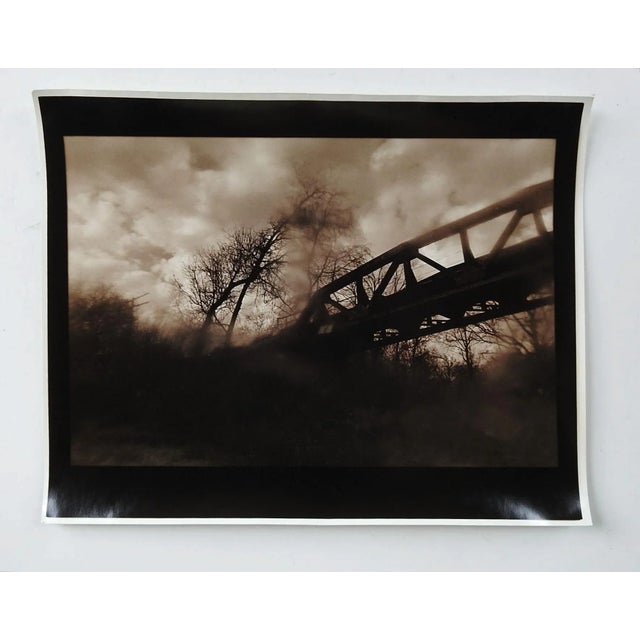 Vintage circa 1990's photograph on heavy paper by Eric C. Weller (20th century) Texas. Dark sepia toned semi glossy...