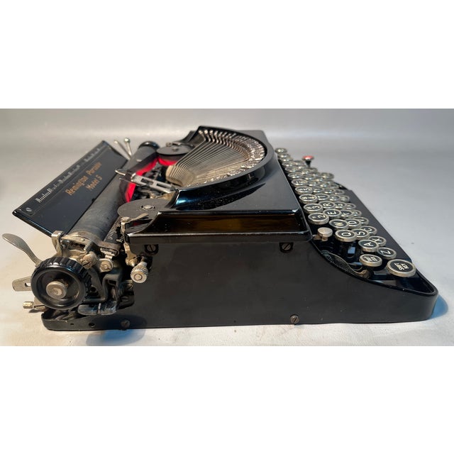An uncontested classic from typewriter history. This prized Remington Portable Model 5 typewriter is known for its...