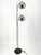A floor lamp * Manufacturer: Gepo Amsterdam * Elegant and classic Space Age lamp * Two globe spotlights, freely height-...