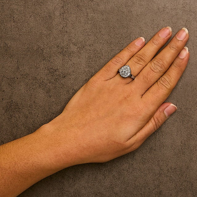 Early 21st Century 10K White Gold 1/2 Cttw Round & Baguette Cut Diamond Pear Shaped Domed Pavé Cluster with Halo Cocktail Ring (H-I Color, SI1-SI2 Clarity) - Size 7.5 For Sale - Image 5 of 6