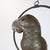 Copper, brass and aluminium Parrot on a hoop hanging stand by Sergio Bustamante, circa 1960. Sergio Bustamante is a...