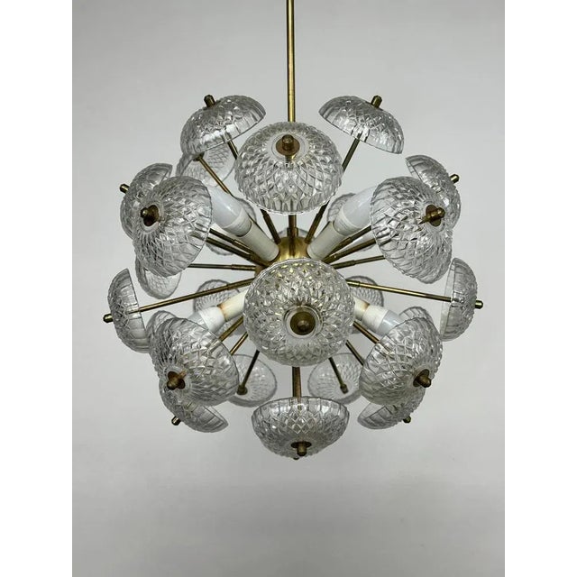 Space age Dandelion chandelier by Kamenický Šenov in very nice original condition. One arm with glass is missing from the...