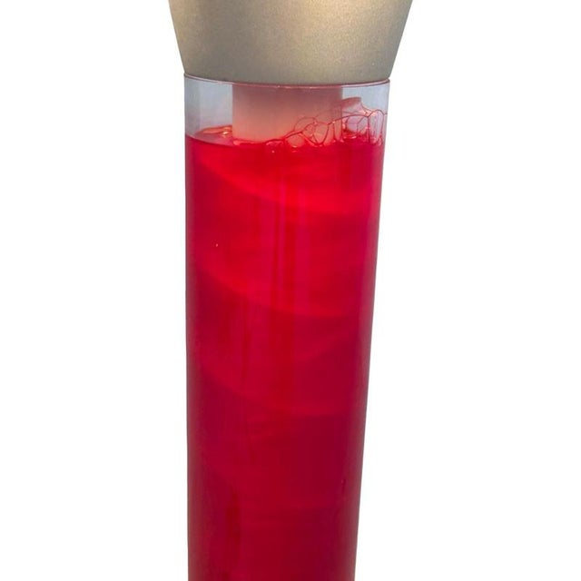Unique lamp made with a liqued filled centre that has a motor inside so the liquid is always in motion. Giving an effect...