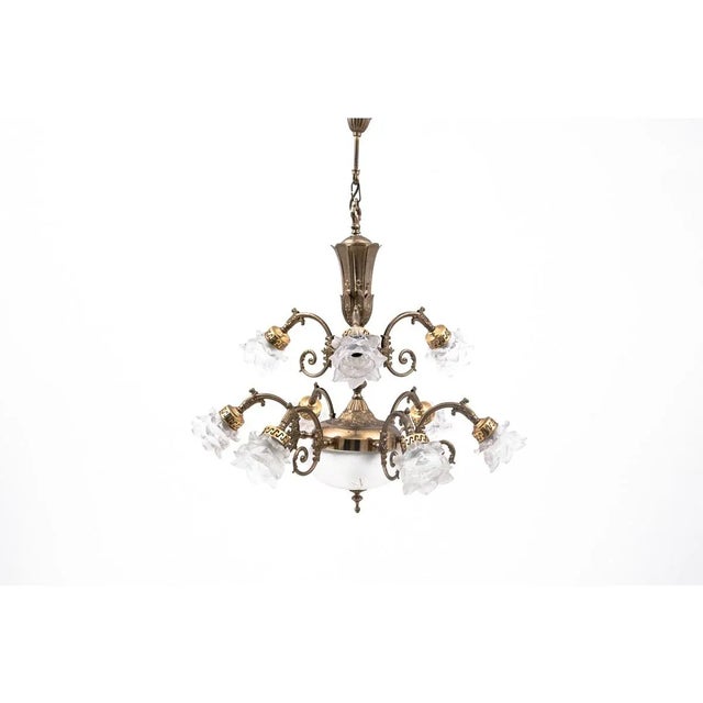Brass Chandelier, Western Europe, 1950s, in Flawless conditions. Designed 1950 to 1959 Up to 250V (Europe/UK Standard).The...