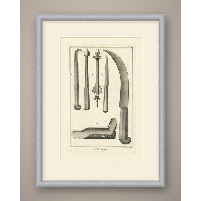 An original antique copper engraving, uncolored, from the chirurgie plates of the encyclopédie. Fig. 1 is an instrument...