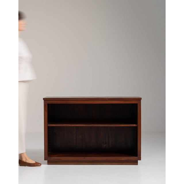Open mahogany bookcase in Rich Mahogany. Its rich mahogany finish sets off two open shelves, brass gallery trim, a...