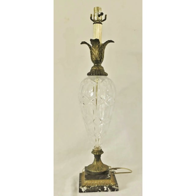 Beautiful vintage tall cut crystal and ornate gold metal lamp with black & white marble base. Made in the USA - Circa...