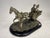 Beautiful silver laimanto pewter sculpture depicting a carriage with horses. Made in Italy from the 70s. Excellent...