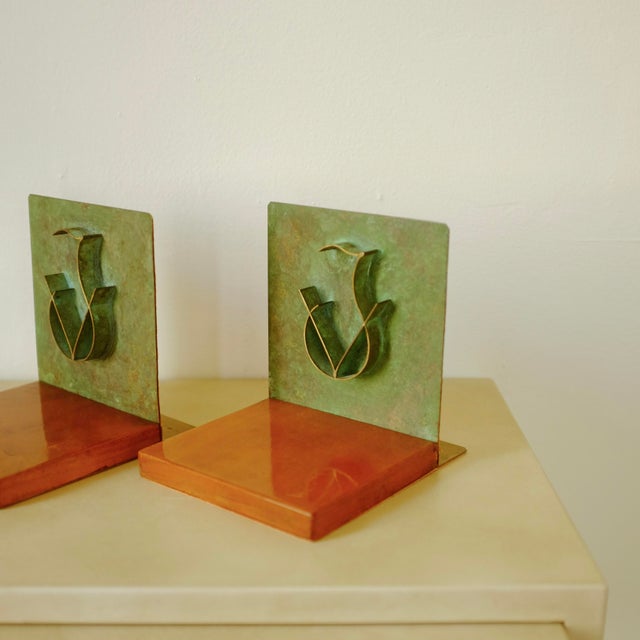Swedish Metal and Wooden 1930s Bookends with a decorative monogram in a green metal, possible bronze. The edges has a...