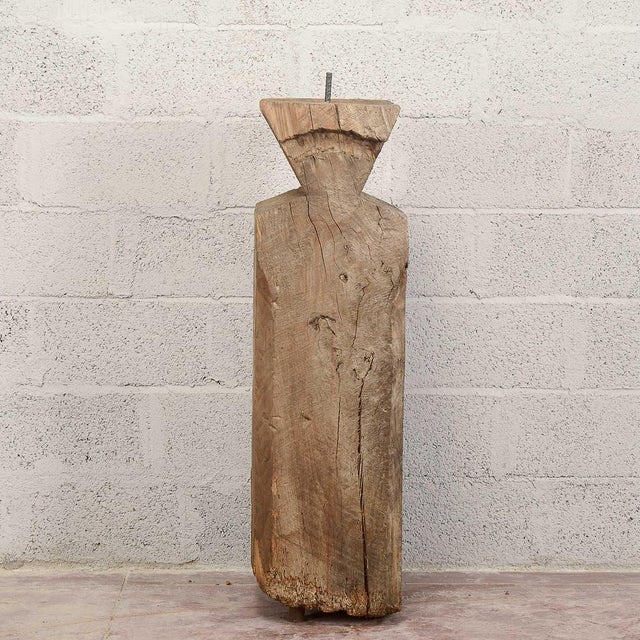 This vintage solid wood pedestal column is a rustic piece of furniture with a striking presence. Crafted from a solid,...