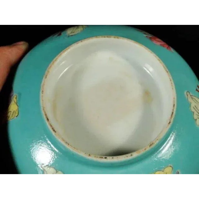 Antique Chinese porcelain bowl decorated with Kwan Yin on a turquoise ground. Glazed inside and out. Good condition....