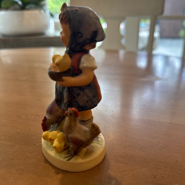 Very nice 5” Goebel Figurine made in Germany. Girl feeding chickens and chicks. Great condition!