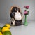 Japanese tanuki statue made of Shigaraki ware, dating from circa 1960, Shōwa period, Japan. The tanuki has a...