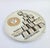Ceramic Calendar Plate Piero Fornasetti Milano, marked on the back 12th Calendar Plate 1979 White ceramic with gold and...