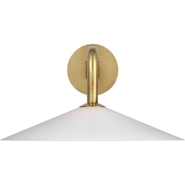 Ponce 9" Articulating Sconce in Hand-Rubbed Antique Brass with Milk White Glass Shade Designer: Amber Lewis Finish: Hand-...