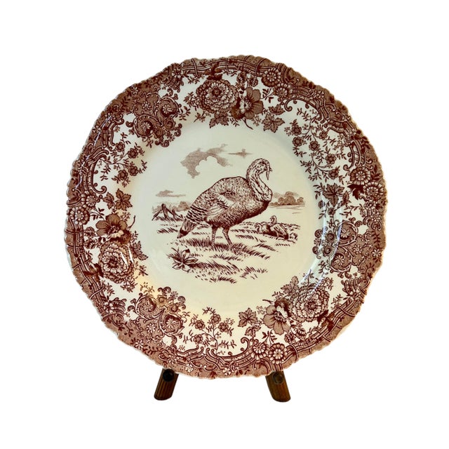 A celebratory set of five red transferware dinner plates by the esteemed William Ridgway. These pieces feature a majestic...