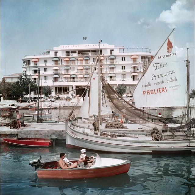 Savioli Spiaggia Hotel by Slim Aarons Boats in the harbour by the Savioli Spiaggia Hotel, Riccione, Italy, 1956. (Photo by...