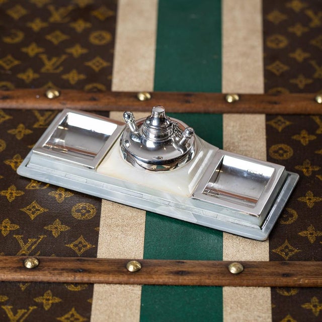 Antique 20th Century English solid silver mounted agate smokers stand. Formed with two silver ashtrays either side of the...