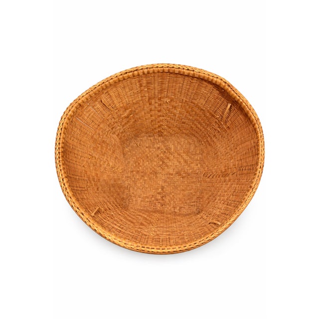 Boho Chic 15 Inch Wide Vintage Handwoven Round Reed Market Basket With Strap Loops Mid-20th Century Organic Modern Storage For Sale - Image 3 of 9