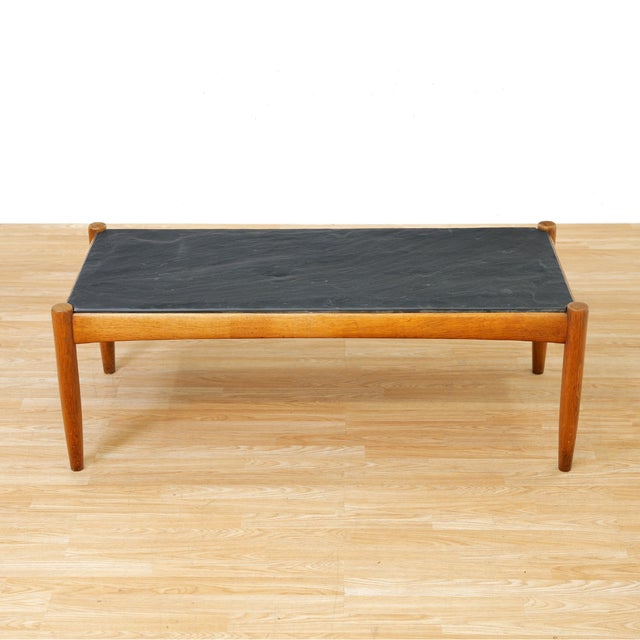 This is a classic piece of Scandinavian mid-century design. A 1960s Amiral Coffee Table in Slate and Oak designed by Eric...