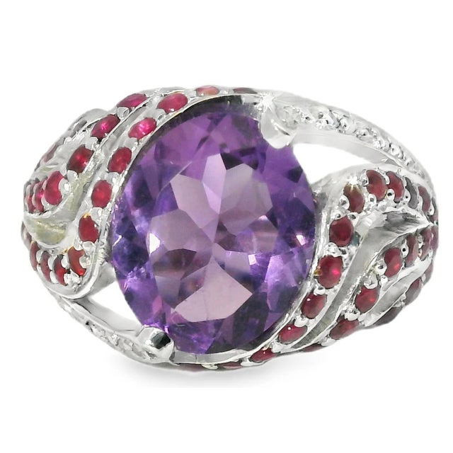 Experience the perfect combination of elegance and color with this 14K White Gold Gemstone Ring. Featuring a striking...