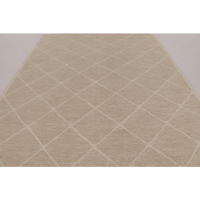 Handwoven in high-quality semi-worsted wool, this 9x12 flatweave is an exciting new addition to Rug & Kilim’s Scandinavian...